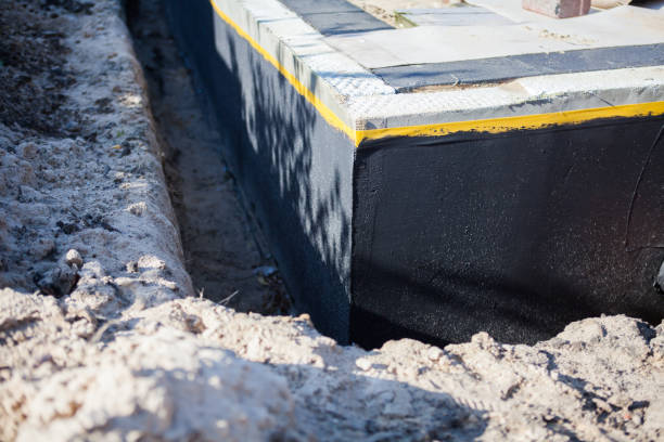 Professional Waterproofing technician working in Jeffersonville, KY
